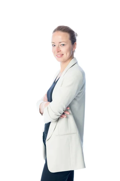 Business woman standing with arms crossed against white background. — Stock Photo, Image