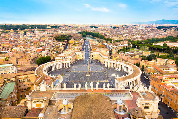 Rome, Italy. Famous Saint Peters Square in Vatican and aerial view of the city from Papal Basilica of St Peters dome.