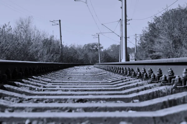 Railways tracks in blue grey toned. — Stock Photo, Image