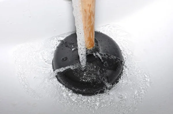Plunger and clogged sink. — Stock Photo, Image