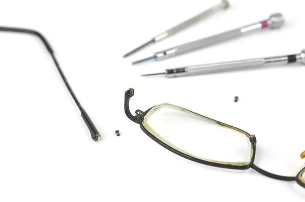 Eyeglasses repair concept. Royalty Free Stock Photos