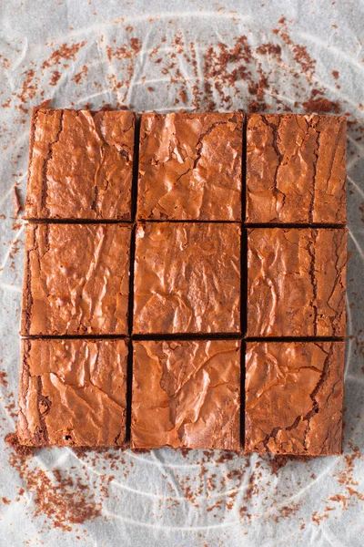 Homemade organic fudge and crispy brownies on baking sheet