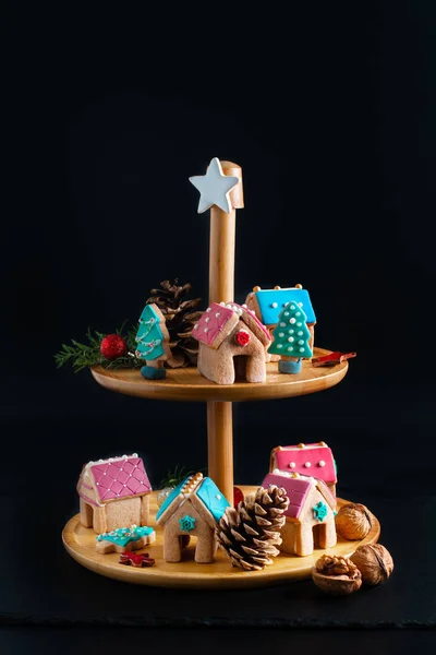Holiday food DIY pastel Christmas Cookies, Gingerbread Houses, and Christmas tree for gift or party