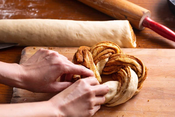 Food bakery concept making bread dought for Cinnamon Roll Braide