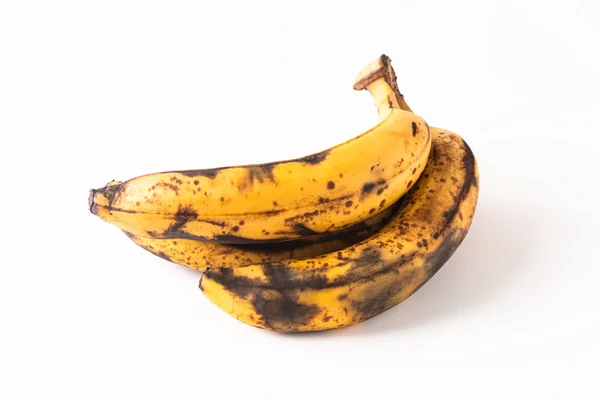 Voedsel concept overrijpe fase van bananen geïsoleerd op witte backgro — Stockfoto