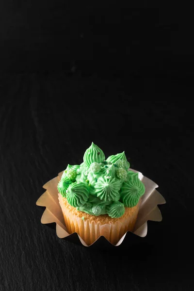 Bakery concept Homemade Sponge vanilla cupcake green tone butter — Stock Photo, Image