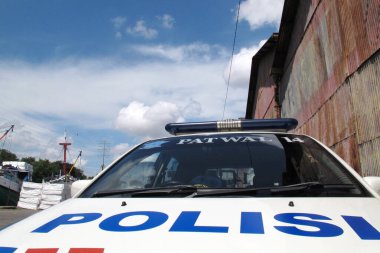 SURABAYA - INDONEZYA, 23 Haziran 2013: Beyaz Endonezya trafik devriyesi