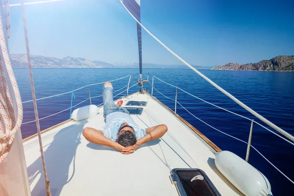 Man resting On Yacht in Greece