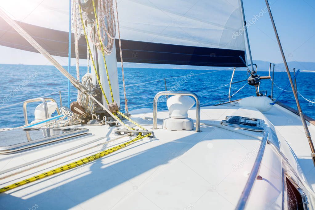 Sailing. Ship yachts with white sails in the open Sea.