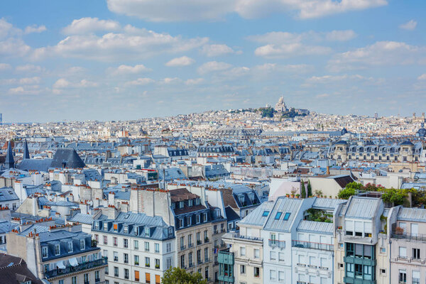Classic Parisian buildings. Aerial view of roofs.