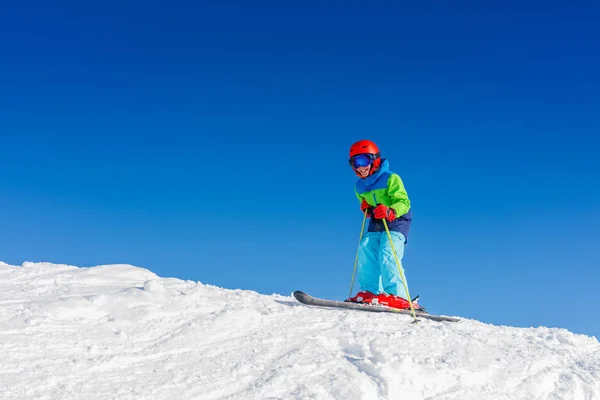 Cute skier boy in a winter ski resort. — Stock Photo, Image