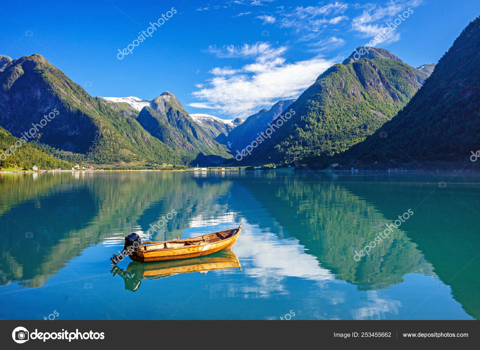 Beautiful Nature Norway natural boat and mountain. Stock Photo by 253455662