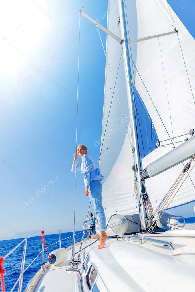 Young Beautiful Girl Relaxing On Yacht In Greece Larastock Young Beautiful Girl Relaxing On Yacht In Greece Larastock