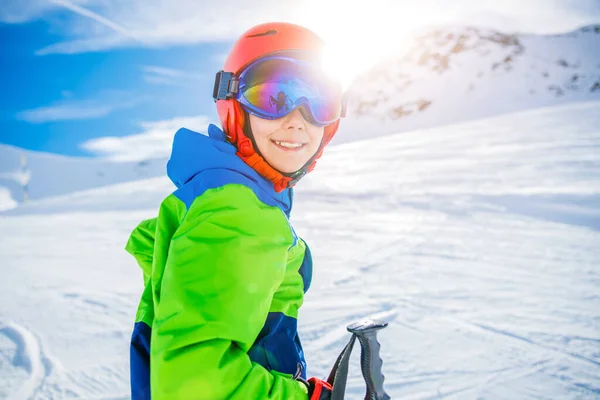 Cute skier boy in a winter ski resort. — Stock Photo, Image