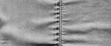 Dikilmiş açık siyah kot kot pantolon kumaş kumaş arka plan ve duvar kağıdı