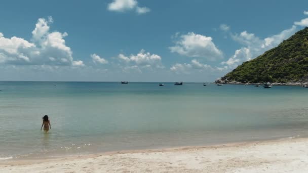 Flying over amazing white sand beach and tropical lagoon with boats — Stock Video