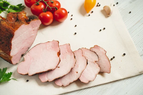 Traditional smoked meat on table