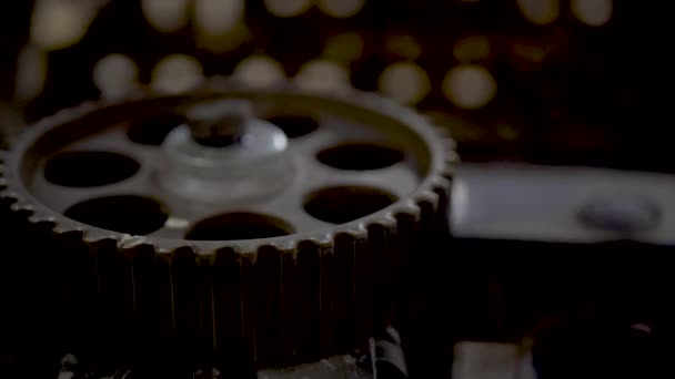 Gears of the engine in the foreground — Stock Video