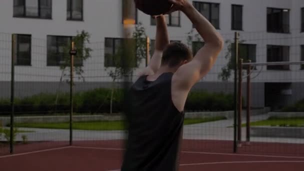 Successful dunk shot from street basketball player — Stock Video