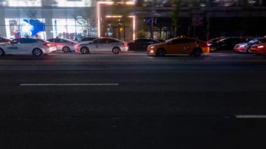 Kore kalabalığın modern Asya Downtown Timelapse akşam hareketli taşıma ile