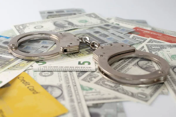 Dollar euro and credit cards With Handcuffs. — Stock Photo, Image