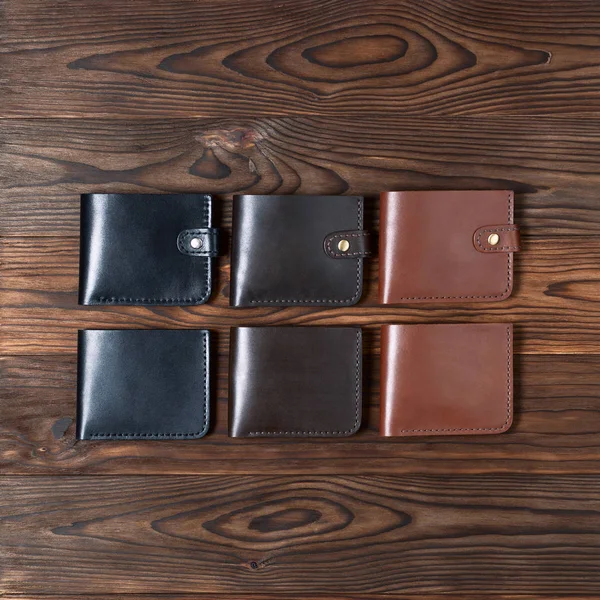 Six Handmade Leather Wallets Wooden Textured Background View Wallet Stock — Stock Photo, Image