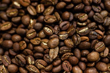 Taze kavrulmuş Arabica kahve çekirdekleri. Harika bir backgroung. Duvar kağıtları veya photobackground için iyi.