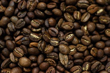 Taze kavrulmuş Arabica kahve çekirdekleri. Harika bir backgroung. Duvar kağıtları veya photobackground için iyi.