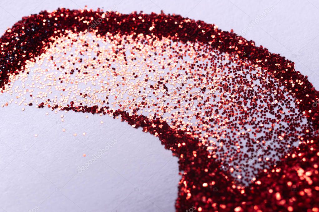 A hue red nail gritter for manicure. Red glitter shining on dayl