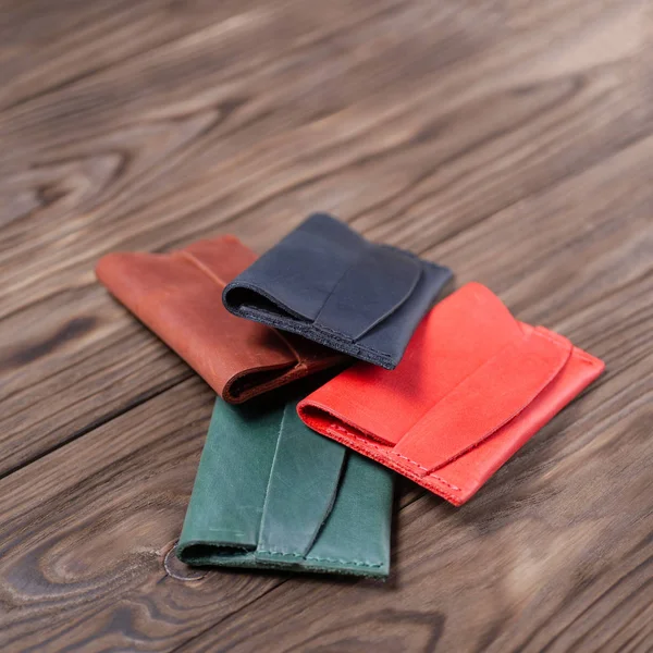 Flat lay photo of four different colour handmade leather one poc — Stock Photo, Image