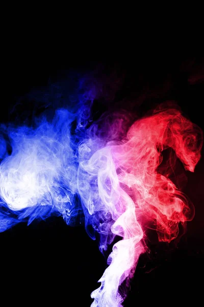 Цветные облака брызг с спреем кипящей жидкости. Два цвета тумана — стоковое фото