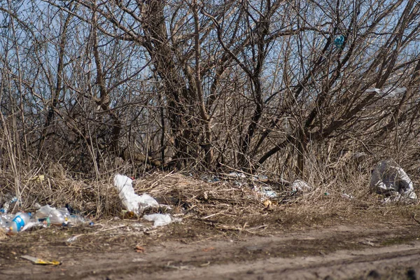 Trash on the agriculture field. Ecology problem and big harm to — Stock Photo, Image