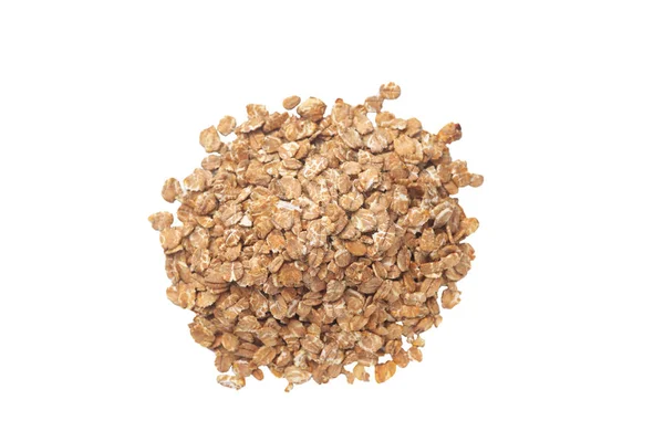 En massa flingor granola flingor isolerade på vit bakgrund. — Stockfoto