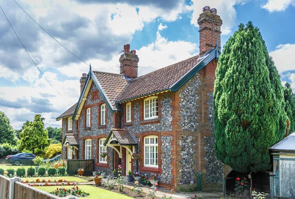 Beautiful English house with many details at the entrance, on a beautiful summer day