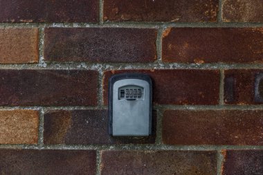 Güvenlik klavye bir tuğla duvara bir kamp, İngiltere