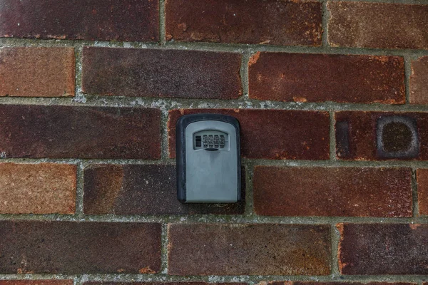 Security keyboard at the entrance of a bungalow in a Norfolk campsite, in England