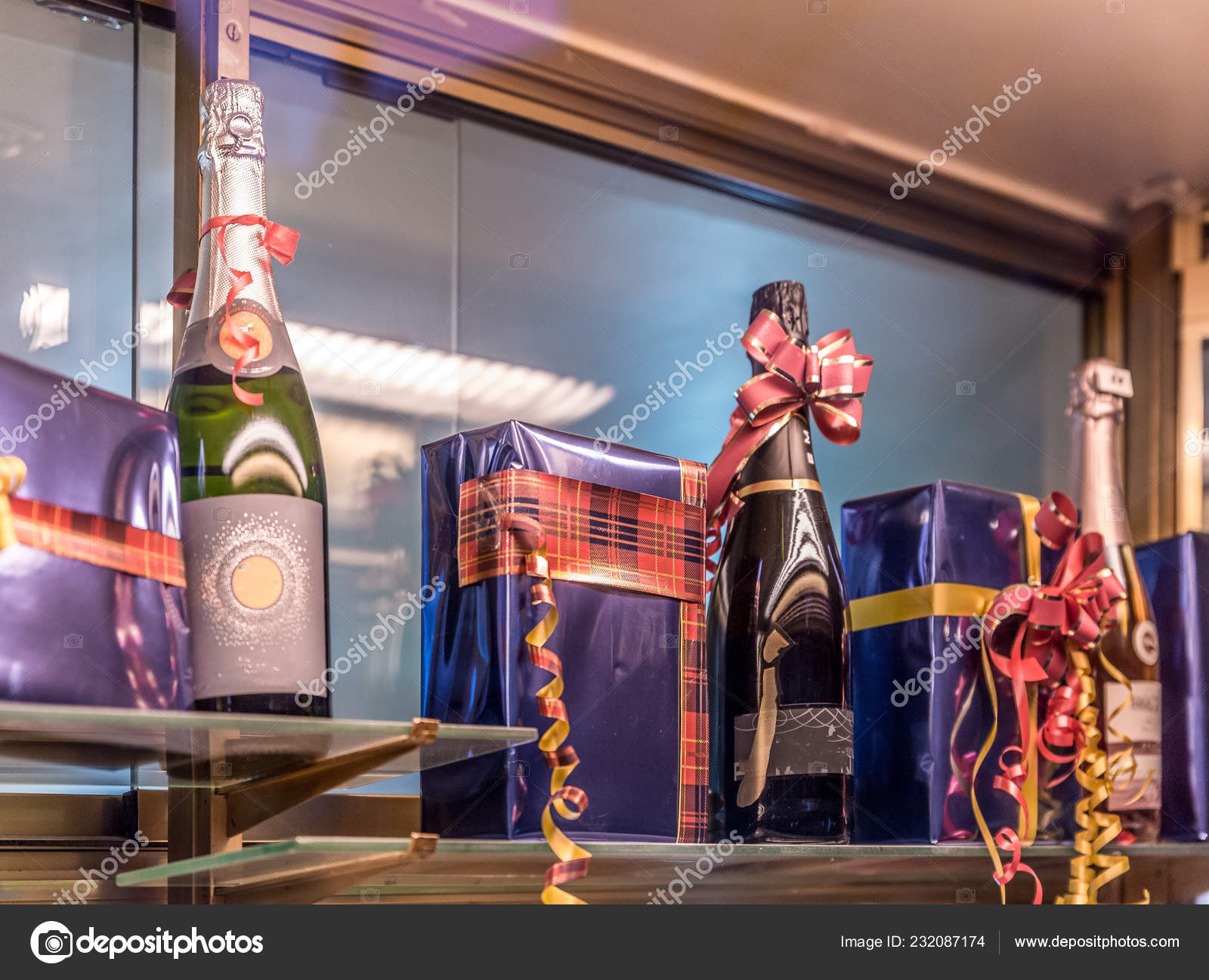 Bottles Champagne Next Boxes Wrapped Wrapping Paper Displayed Display Cabinet Stock Editorial Photo C Oscar Porras Info Gmail Com 232087174