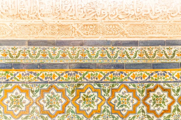 Arab tiles in the palace of Alhambra in Granada, Andalusia, Spain
