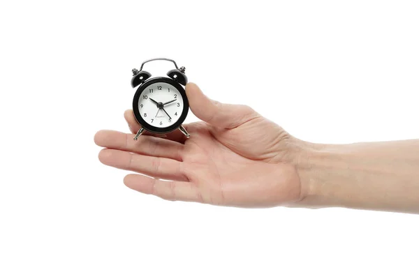 男性の手は、時計を保持し、白い孤立した背景に時間を示しています. — ストック写真