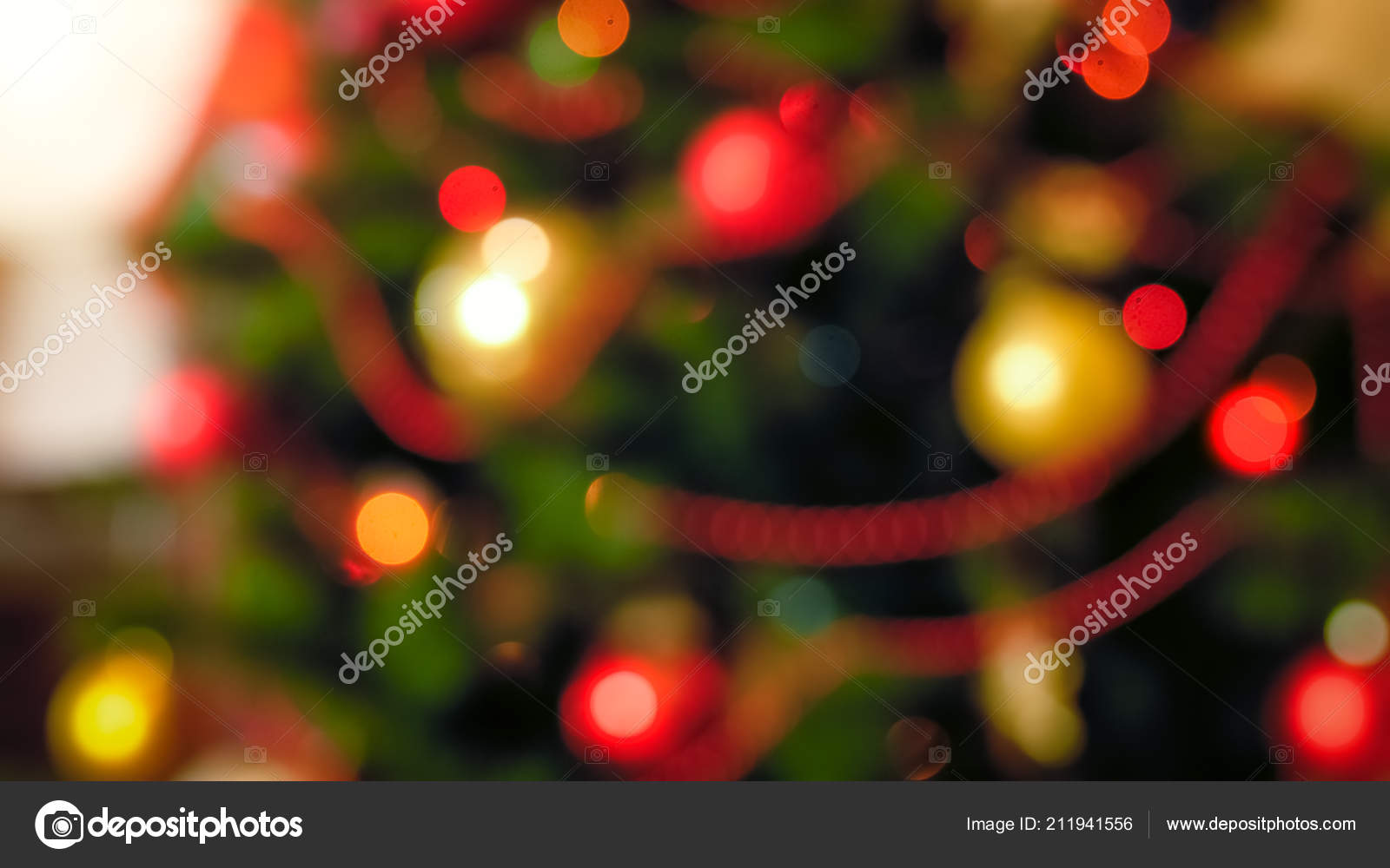 Out Of Focus Image Of Red And Golden Baubles Hanging On