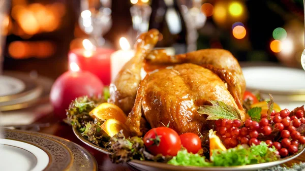 Closeup photo of tasty baked turkey with fresh vegetable on festive family dinner — Stock Photo, Image