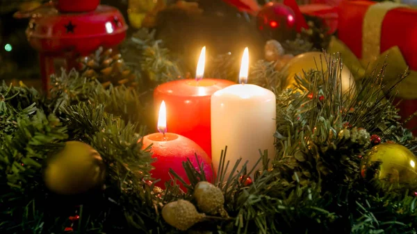 Closeup image of three burning candles on Christmas eve — Stock Photo, Image