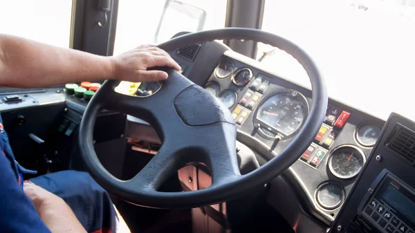 Closeup image of drivers hands on big truck steering wheel — Stock Photo, Image