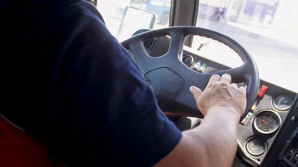 Closeup image of male bus driver in airport driving airport bus shuttle — Stock Photo, Image