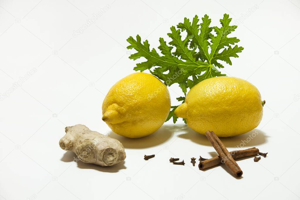 lemon with spices on a white background
