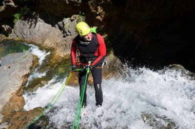Canyoning in Otal Valley, Pyrenees, Huesca Province, Aragon in Spain. clipart