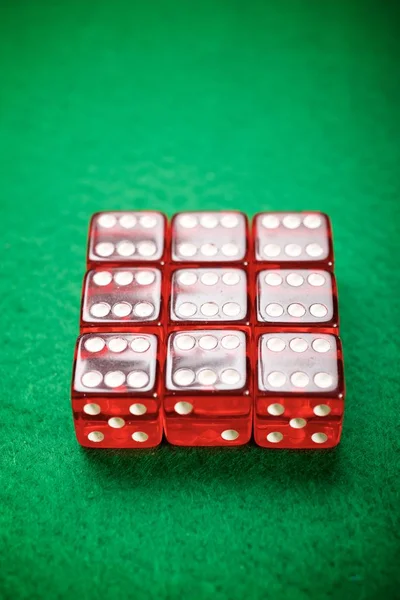 casino dices on a green felt