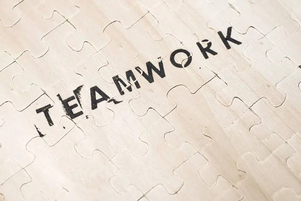 Teamwork Word Afgestempeld Een Houten Puzzel — Stockfoto