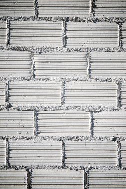 Arka plan beyaz tuğla duvar ile oluşturulan.