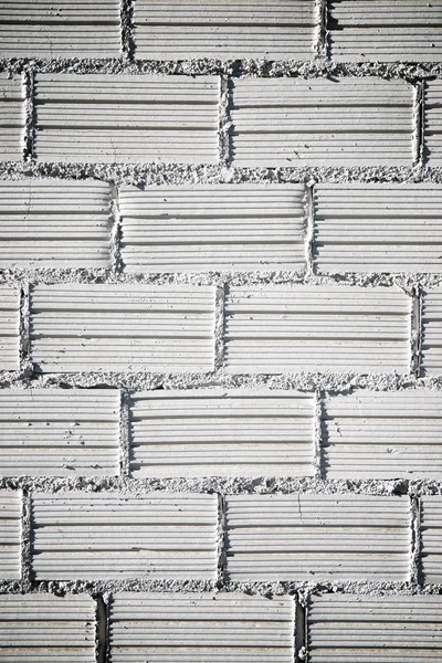 Arka plan beyaz tuğla duvar ile oluşturulan.